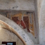 Avigliana-Chiesa di San Pietro-Navata minore, prima campata, archivolto parete Sud, San Gregorio Magno, particolare --Navata minore, prima campata, archivolto parete Sud, San Gregorio Magno, particolare
