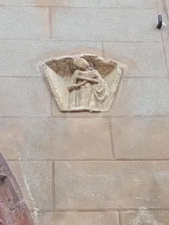 Bassorilievo murato in facciata - Oratorio di San Bartolomeo a Valenza